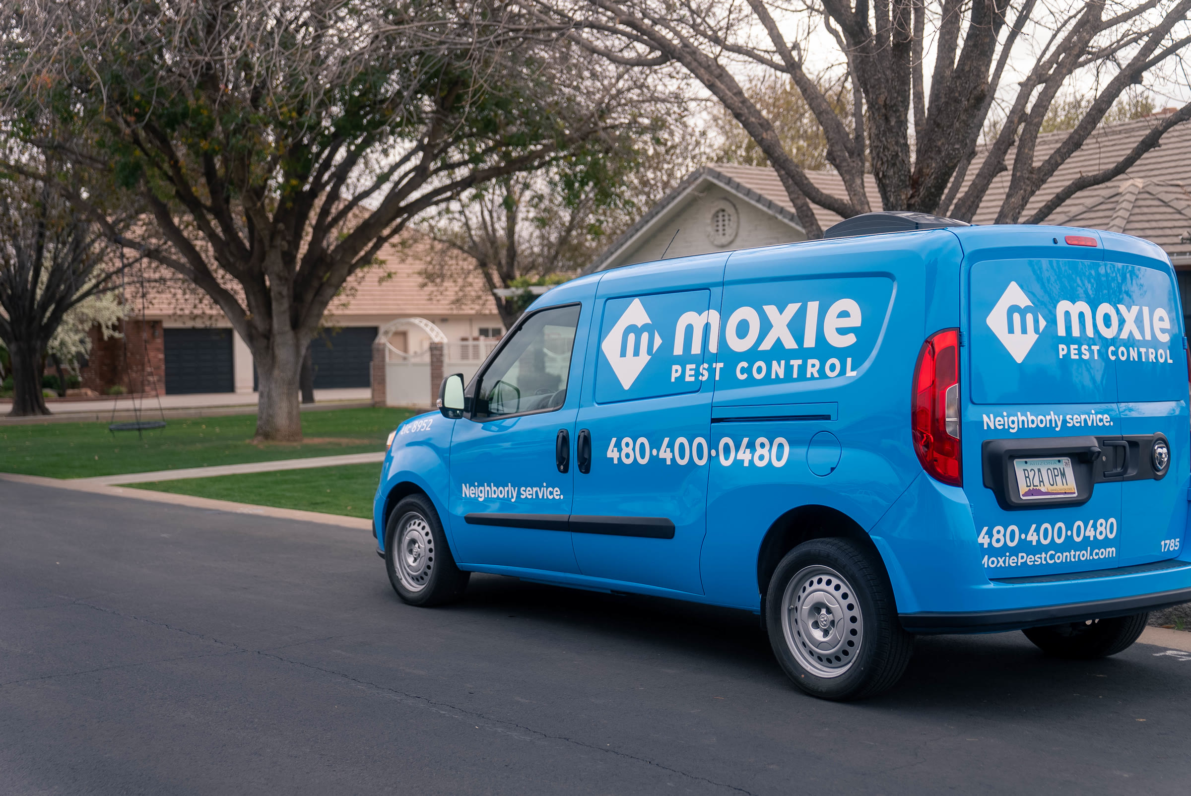 Moxie Pest Control technician lit for a brand shoot